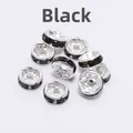 Macro shot of silver metal rondelle spacer beads with black rhinestones for DIY jewelry - 8mm (2000 Pieces/Pack) / Black Rhinestone