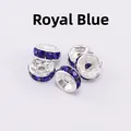 Macro shot of five silver rondelle spacer beads with royal blue rhinestones for DIY jewelry - 10mm (1000 Pieces/Pack) / Royal Blue Rhinestone