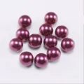 Detailed view of glossy dark purple round ABS faux pearls for DIY jewelry making crafts - 10mm (500g/Pack) / Purple