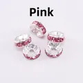 Macro detail of silver-plated spacer beads with pink rhinestones for DIY jewelry making - 4mm (2000 Pieces/Pack) / Pink Series