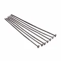 Close-up of seven gun black metal T-pins for DIY jewelry making and bead craft projects - 26mm (200 Pieces/Pack) / Gun Black