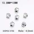 DIY metal paw print spacer beads for jewelry making in silver alloy finish - 300PCS/Pack / Silver Bear Paw