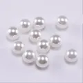 Round white ABS imitation pearl beads with lustrous finish for DIY jewelry crafts - White