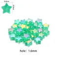Perles DIY en acrylique vert clair en forme d'étoile avec revêtement aurore AB - Pack de 100 / Vert