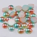 Macro detail of gradient iridescent flatback half pearls for DIY crafts and nail art - 4mm / Green Red