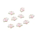 Macro shot of light pink heart pendants with white wings and golden alloy edges for DIY - Pink