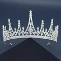 Couronne élégante en alliage argenté avec strass brillants sur un fond bleu profond - Style Royal Radial en Flocon de Neige(TS-J2759)