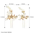 Dettaglio di due forcine da sposa dorate con perle e cristalli incluse le dimensioni - Set In Oro A Due Pezzi Hs-j6210g