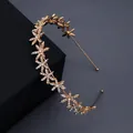 Elegant gold metal headband featuring sparkling star-shaped rhinestones for bridal hair styling - Gold