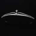 Elegant silver bridal crown with crystals and drop-shaped stone on a black background - Silver Curved Headband Ts-j2937s