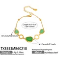 Goldenes Edelstahl-Armband mit grünen ovalen Katzenaugen-Steinen und Verlängerung - Armband / 18.5+5cm / Gold Grün