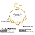 Goldenes Edelstahlarmband mit ovalem Katzenaugenstein und verstellbarer Kette 18,5+5cm - Armband / 18.5+5cm / Champagner