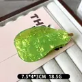Grüne Haarspange in Birnenform mit strukturierter Oberfläche, Maße ca. 7,5x4x3cm - Birne