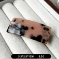 Pink and black tortoiseshell hair clip with France Handmade text in golden finish - Coffee Tortoise Shell