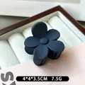 Matte navy blue flower hair claw clip measuring 4x4cm in a stylish jewelry display case - Navy Blue
