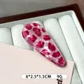 Haarklem van cellulose acetaat met roze luipaardprint en gouden belettering chic - Zijclips