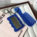 Glittery blue acrylic heart mirror and comb keychain set in a jewelry box - Blue