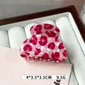 Pink leopard print cellulose acetate hair claw clip measuring 4x3.5x3.5cm and 9.5g weight - Sycee / Ingot