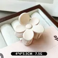 Creamy white matte flower hair claw clip with a 4*4*3.5CM elegant small shark design - Off White