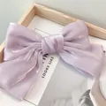 Elegante fermaglio per capelli con grande fiocco lilla e finitura perlata lucida - Viola Chiaro