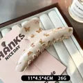 Elegante crèmekleurige vlinder haarklem met bruine patronen maat 11cm - Crème Vlinder Gebogen