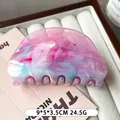 Ovale haarklem met roze en blauw marmerpatroon en glanzende afwerking voor dik haar - Verloop Roze