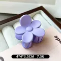 Matte purple flower hair claw clip in a minimalist 5-petal design for daily styling - Purple