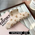 Beige vlinder haarklem met bruin patroon voor een elegante haarstijl accessoire - Crème Vlinder Haarklem
