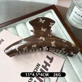 Dark brown butterfly print hair claw clip made of tortoiseshell style acetate resin - Coffee Butterfly Curved