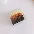 Set de 4 gomas de pelo en espiral mate color Morandi en caja cuadrada transparente - Estilo Mate No.3 / Envase tipo caja