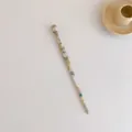 Detail van de acetaat haarpincet met blauwe marmerpatronen en spiraalvormig gedraaid ontwerp - 4# Veelkleurig