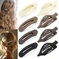 Grandi mollette per capelli opache in toni della terra per donne mostrate su modella - Stile Toni della Terra Opachi