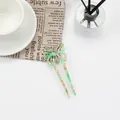 Elegant U-shaped acetate butterfly hair pin with vintage green and white marbled texture - Green