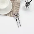 Elegant butterfly hair pin with black and white tortoiseshell acetate marble pattern - Black