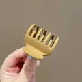 Kleine haarclip in mat gembergeel voor hoge paardenstaart gemaakt van kunststof - Geel