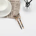 Elegant tortoiseshell acetate butterfly hair pin with double-prong design for women - Light Amber