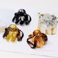 Set of four glossy octopus hair claws in black, transparent, and tortoiseshell finishes - Glossy Black