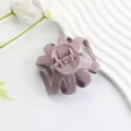 Elegant mauve purple matte hair claw clip with large round octopus teeth design - Glossy Purple