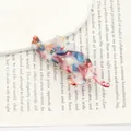 Pince à cheveux chat en acétate avec motif marbré rouge bleu blanc et bords dorés - Arc-en-ciel