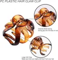 Brown tortoiseshell PC octopus claw hair clip with strong metal spring and matte finish - Red Amber