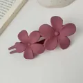 Detail of matte dark pink hair claw with dual flower design for elegant hairstyles - Dusty Pink