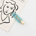 Minimalistische lichtblauwe glitter haarclip met lovertjes en goudkleurige metalen klem - Blauw