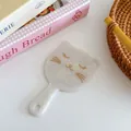 Portable cat-shaped handheld mirror in pearl white acetate finish with golden engraved face - Pearlescent Mermaid Color