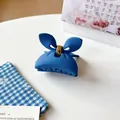 Matte Klein blue bow-shaped hair claw clip with golden metal spring for women - Deep Blue Butterfly