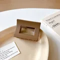 Mocha brown matte shark hair claw clip in large geometric frame design on a beige plate - Square Style (16#) / Dark Coffee