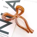 Pinza per capelli a fiocco ambra da 13cm in resina traslucida per acconciature eleganti - Marrone