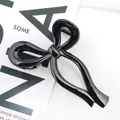 Pinza per capelli a fiocco nero lucido da 13 cm con finitura a specchio per acconciature eleganti - Nero