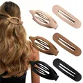 Dettaglio di grandi fermagli per capelli opachi beige e neri con design ovale - Set 2 (Set da 3 pezzi: Clip a banana opache)