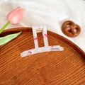 Pinza per capelli rettangolare bianco opaco con stampa ciliegia e molla dorata - Lineare