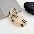 Minimalist acetate hair comb with classic tortoiseshell pattern in a crescent shape - Tortoiseshell / Light Leopard